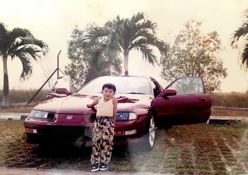 5 Year Old Davidson Posing in front of a Honda Prelude